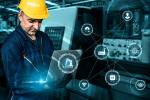 Worker controlling factory equipment via internet enabled smart device